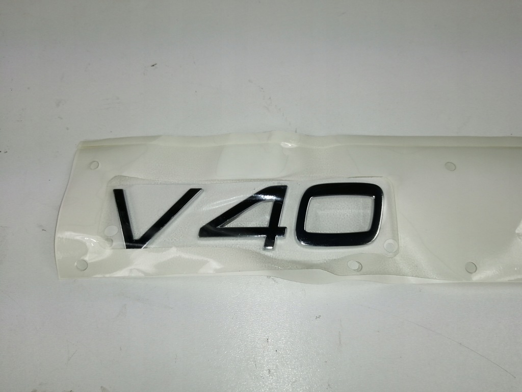 EMBLEMAT VOLVO V40 00-04 ORYGINAŁ 30864036