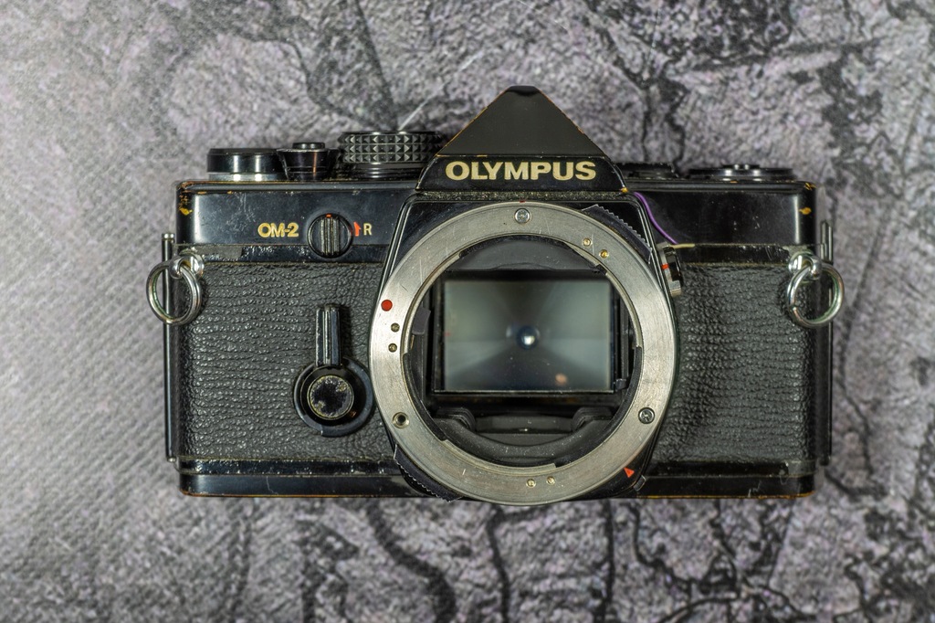 Olympus OM2 czarny - uszkodzony - do naprawy lub na części
