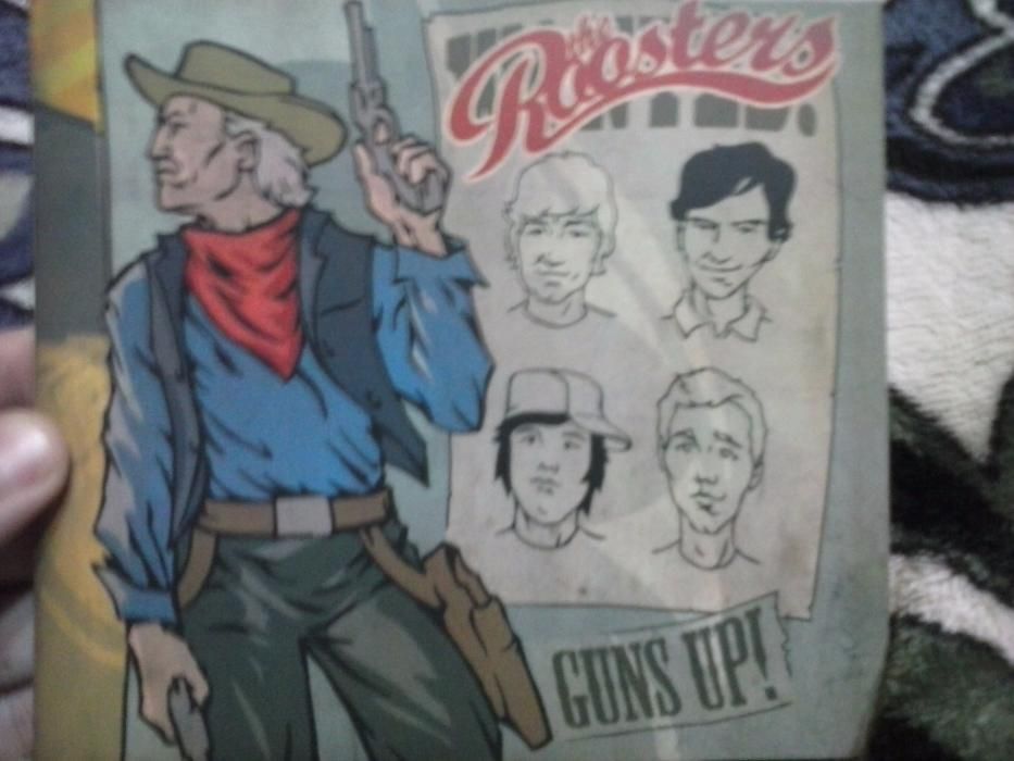 The Roosters - guns up!