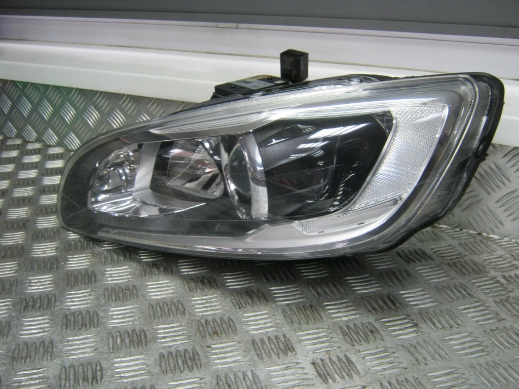 Reflektor xenon lewy Volvo V60 S60 Lift 31420108