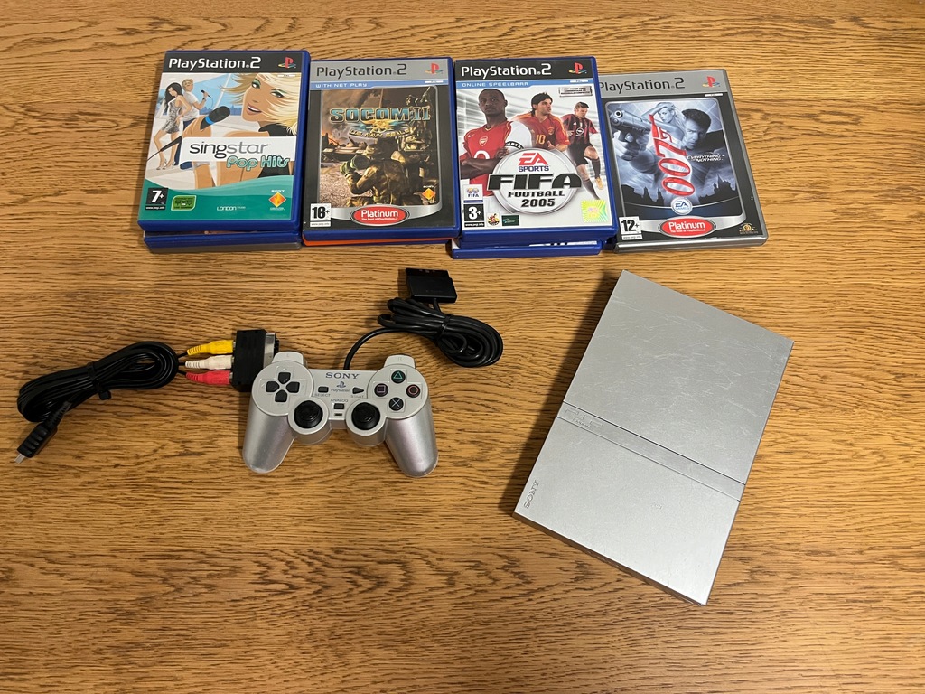 Playstation 2 + 11 gier + pad PS2 SLIM srebrna SPRAWNA