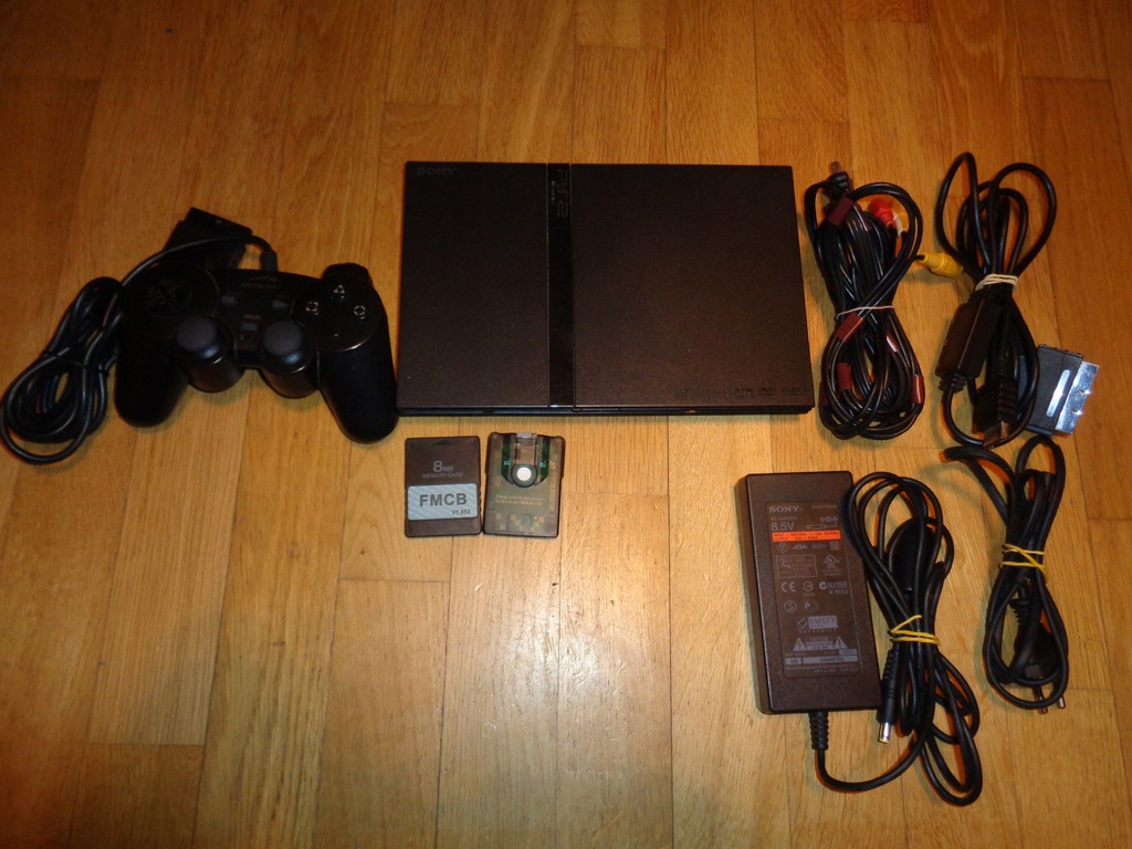 PlayStation 2 SCPH-77004 + MX4SIO + 1 Pad + Mod PSX