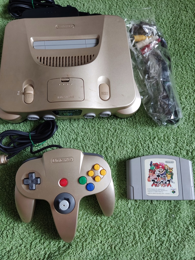 Konsola Nintendo 64 Gold+pad+Super Smash Bros.