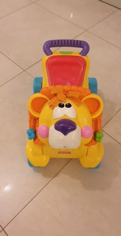 Jeździk , pchacz lew Fisher Price