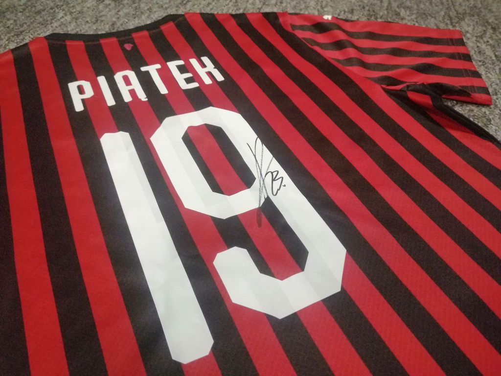 Koszulka AC Milan z autografem Krzysztofa Piątka