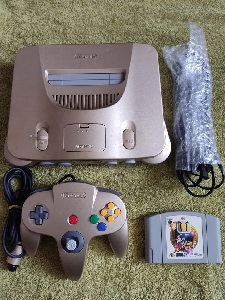 Konsola Nintendo 64 Gold+pad+Baku Bomberman