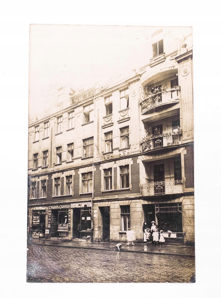 STARA FOTOGRAFIA - SKLEPY MADZIAREK, CYGARA, WĘDLINY, FRYZJER 1911 POZNAŃ ?