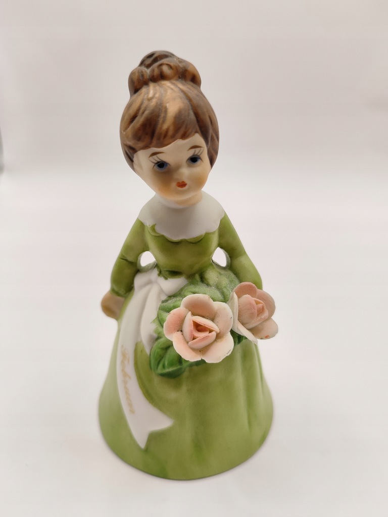 Ceramiczna figurka dziewczynka miesiąc luty kwiaty