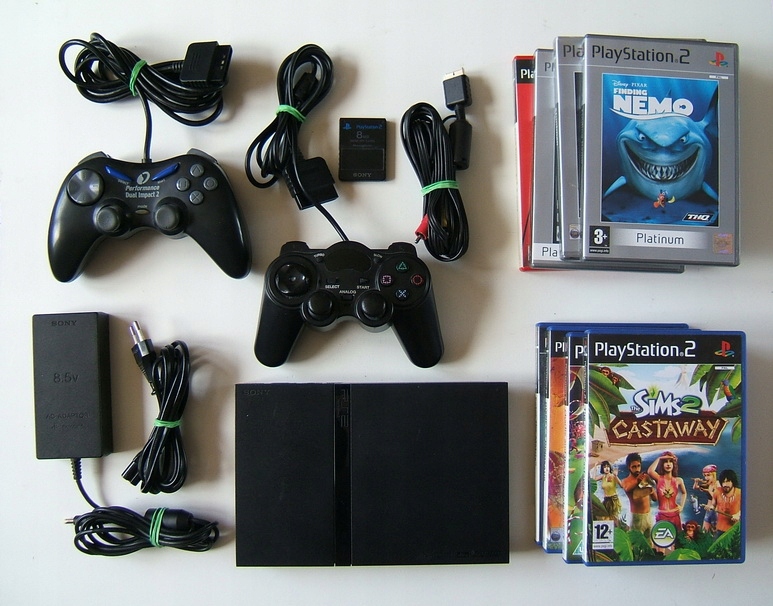 Konsola Sony PS2 SLIM, dodatkowo 8 gier