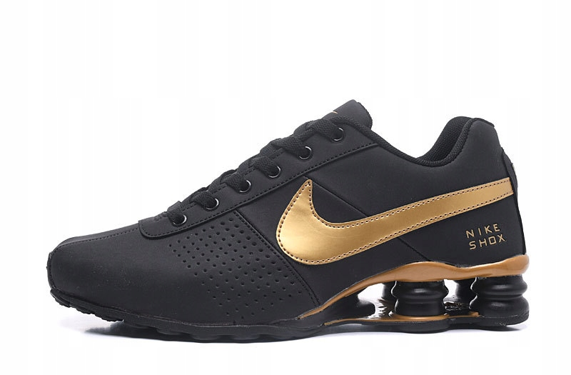 nike shox gold and black