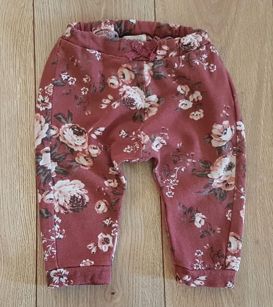 Spodnie róże kwiaty NEWBIE Kappahl 68