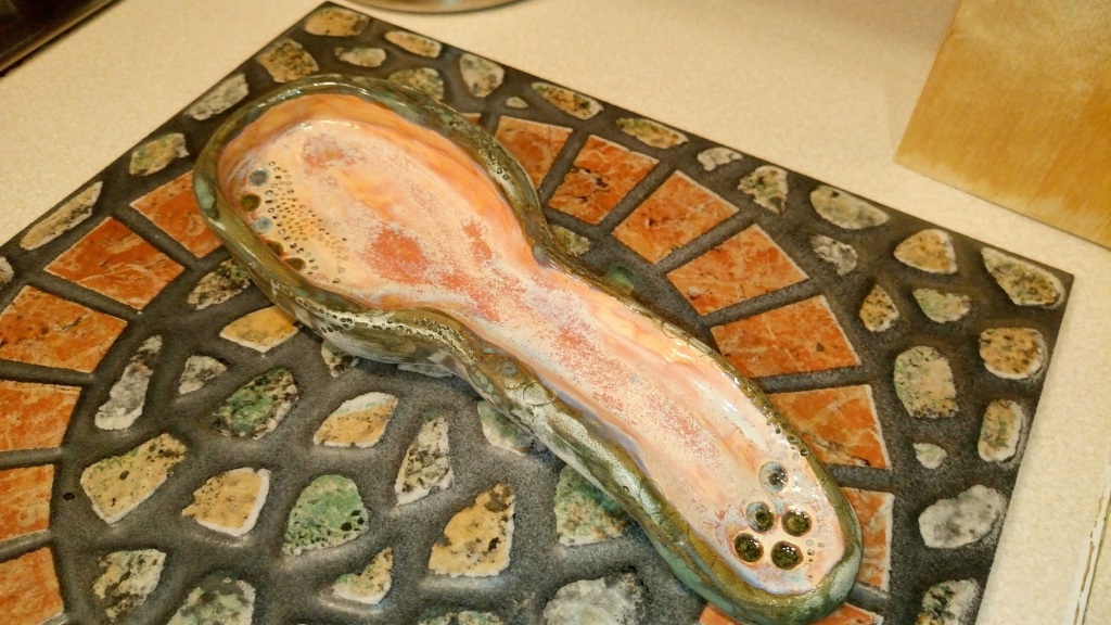 ceramika sosjerka pod  sztućce używane do gotowani