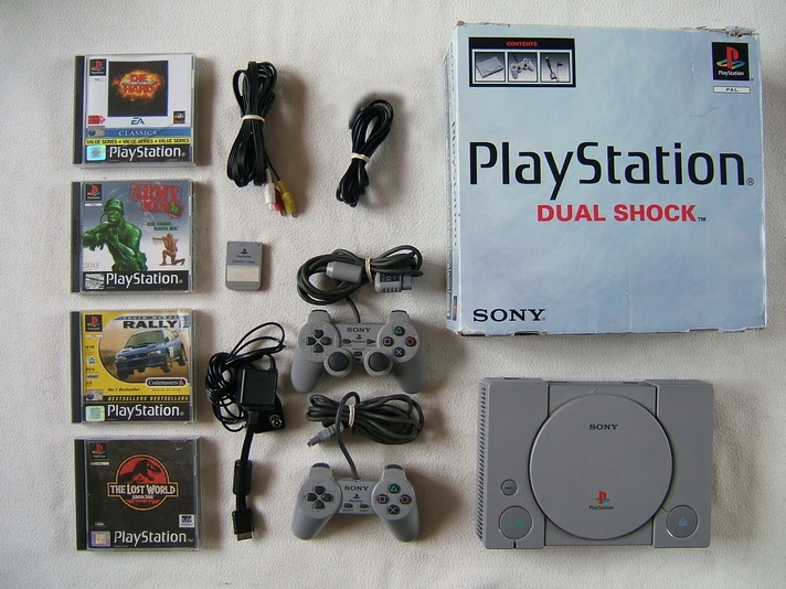 Konsola Sony Playstation PSX BOX akcesoria + 4 gry