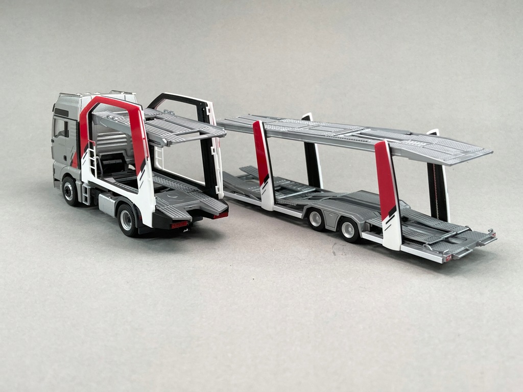 Купить MAN TGX XXL LOHR и 6 Audi UNIKAT — Herpa 1:87: отзывы, фото, характеристики в интерне-магазине Aredi.ru