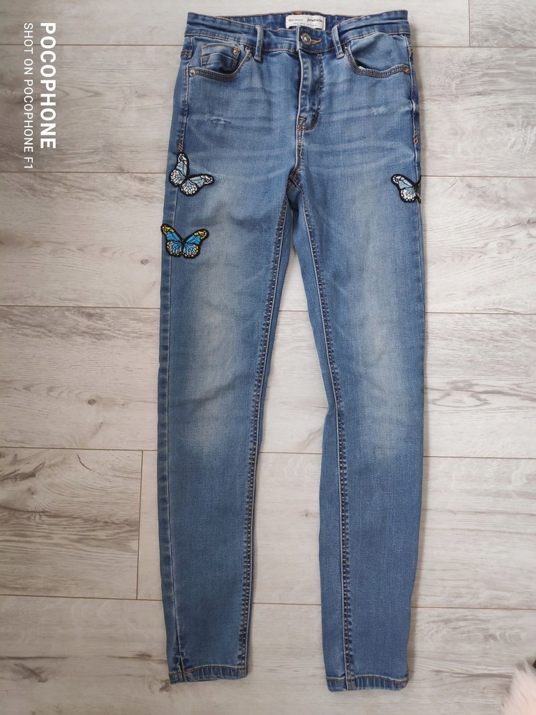 Spodnie jeansy naszywki