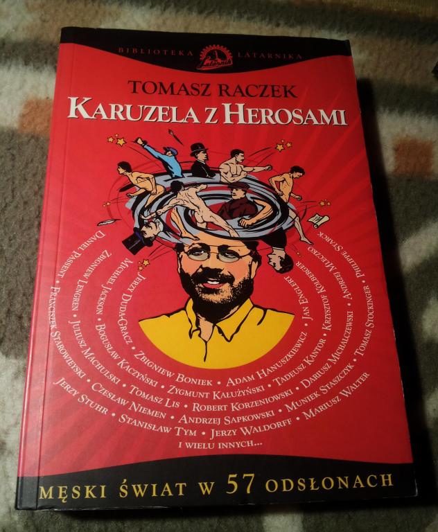 Tomasz RACZEK Karuzela z herosami Z AUTOGRAFEM