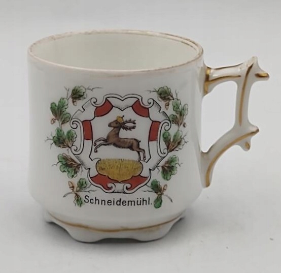 Porcelanowa filiżanka-kubek z herbem Schneidemühl (Piła)