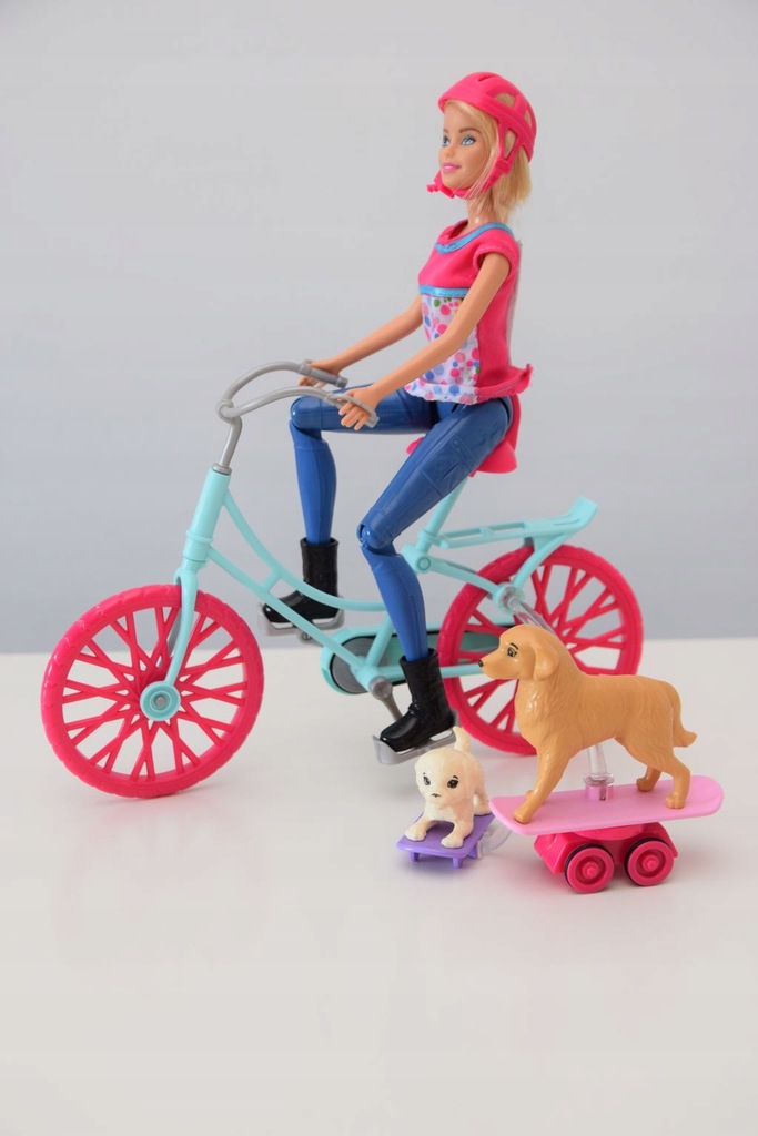 Lalka Barbie na rowerze z pieskami Mattel