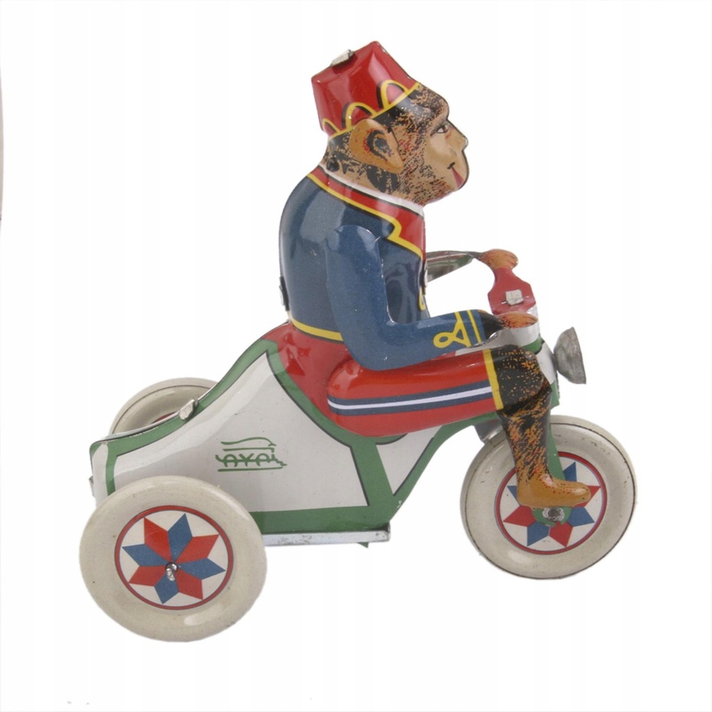 Vintage Wind Up Monkey Riding A Car