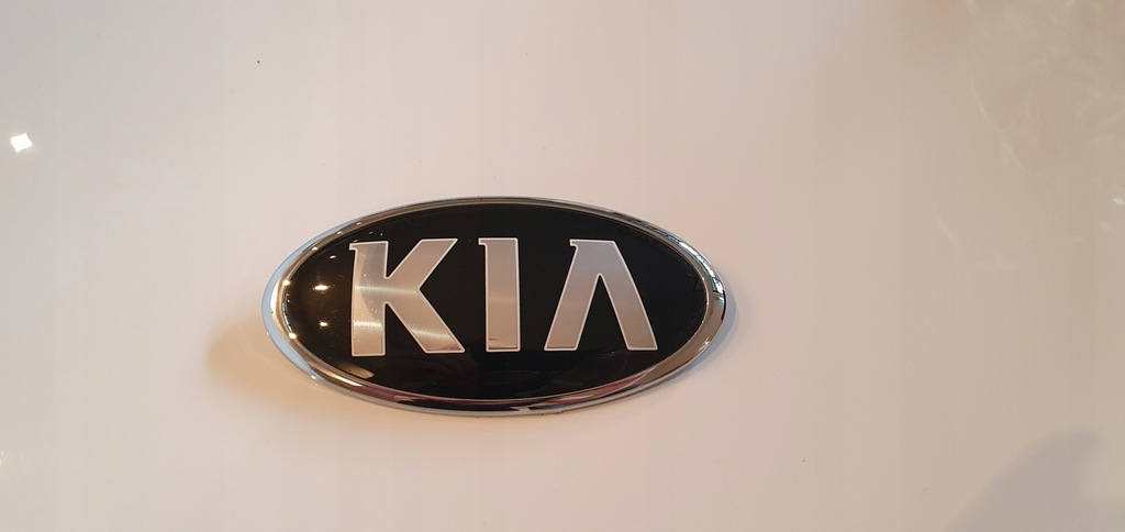 Кольцо киа рио 3. 863201w250. Эмблема "Kia" mobis 863201w250. Эмблема декоративная пластиковая Hyundai Kia 863201w250. Эмблема Киа Рио 3.