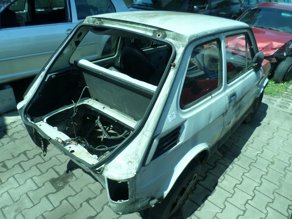 Fiat 126p bis Amortyzator tył tylny lewy 7497060855