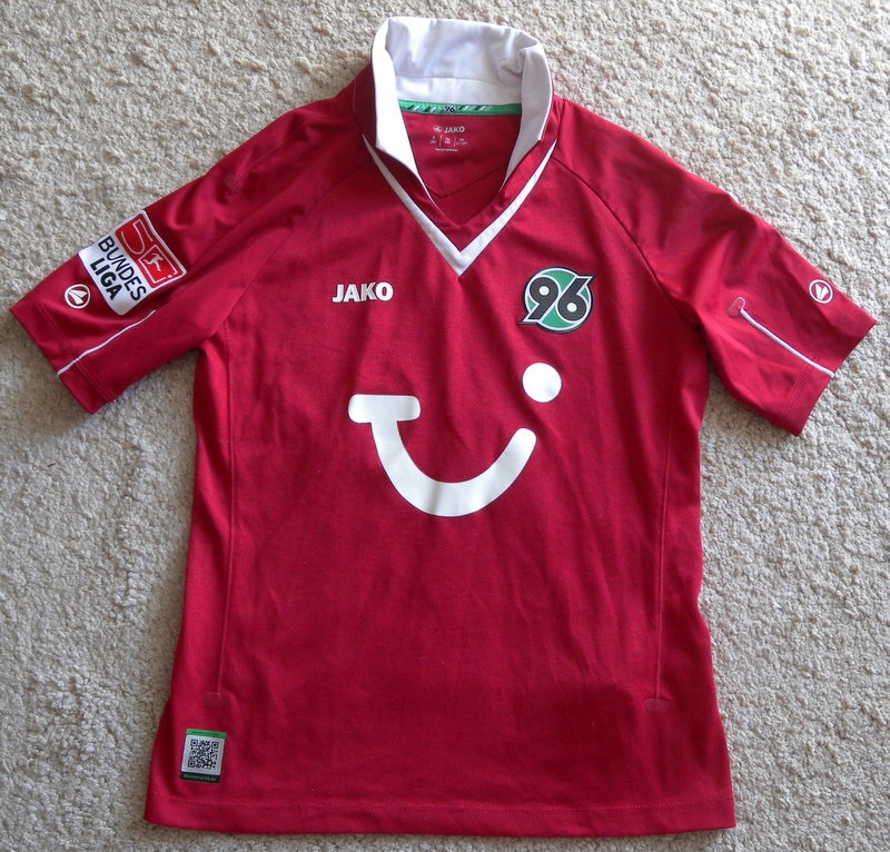 KOSZULKA - JAKO - HANNOVER 96 / NR.39 DIOUF