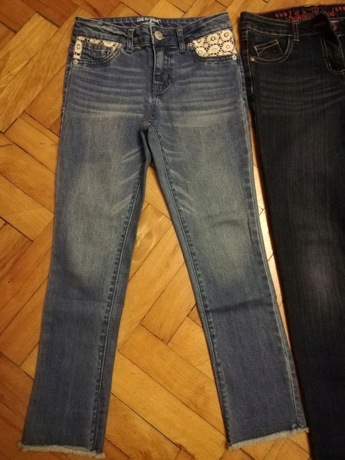 spodnie jeansy (koronka przy kieszeniach)