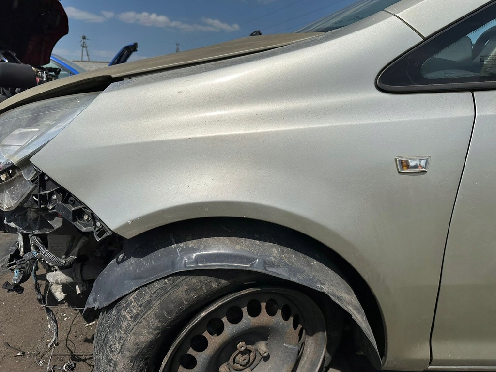 Opel Corsa D 06-14 BŁOTNIK LEWY przedni przód kod lakieru Z40M