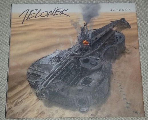 Album "Revenge" z autografem Michała Jelonka