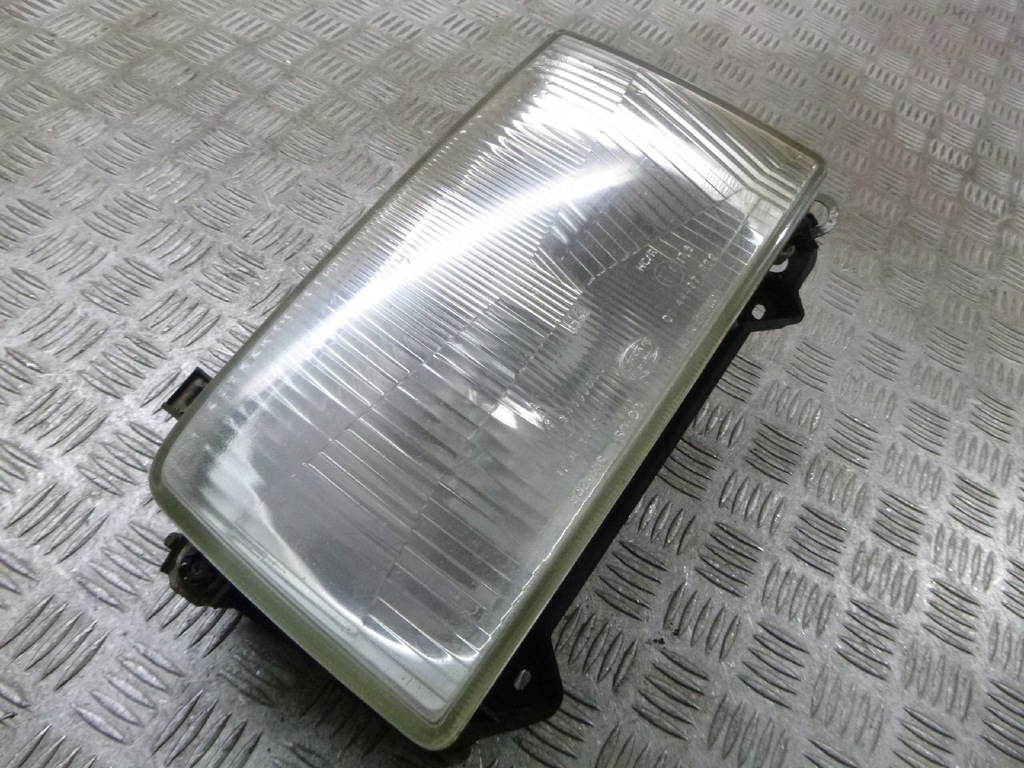 LAMPA LEWY PRZÓD VW TRANSPORTER T4 7726535118