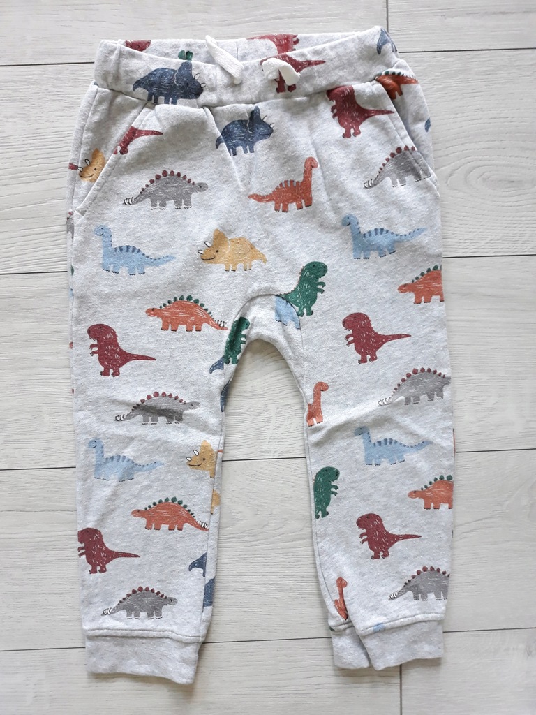 H&M spodnie jasnoszary melanż dinozaury R 104
