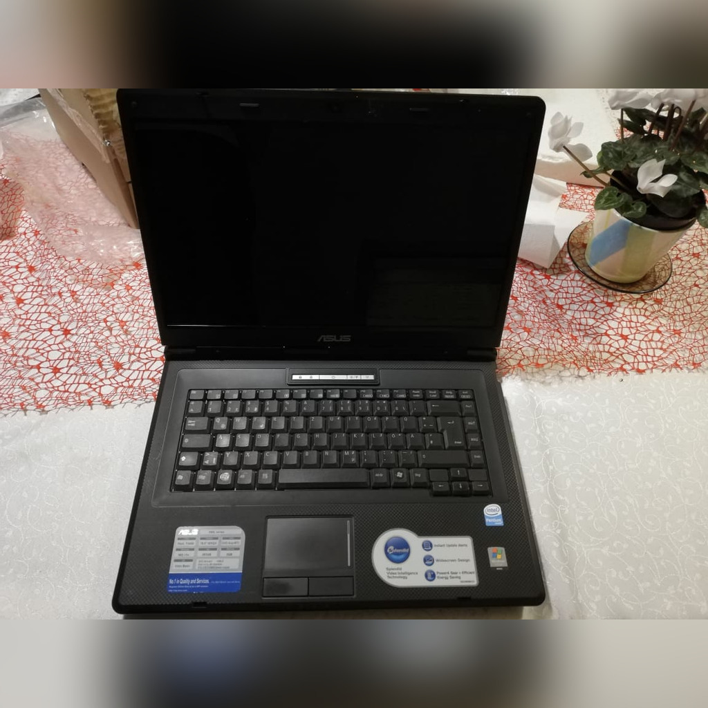 Laptop Asus X58L 3gb ram 500gb HDD stan bdb