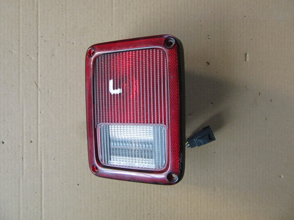 Jeep Wrangler JK 2007 LAMPA LEWA TYŁ 7307579797