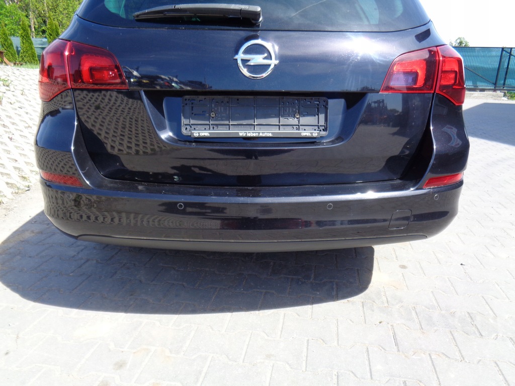 ASTRA J IV KOMBI ZDERZAK TYŁ PDC Z20R 09-15r