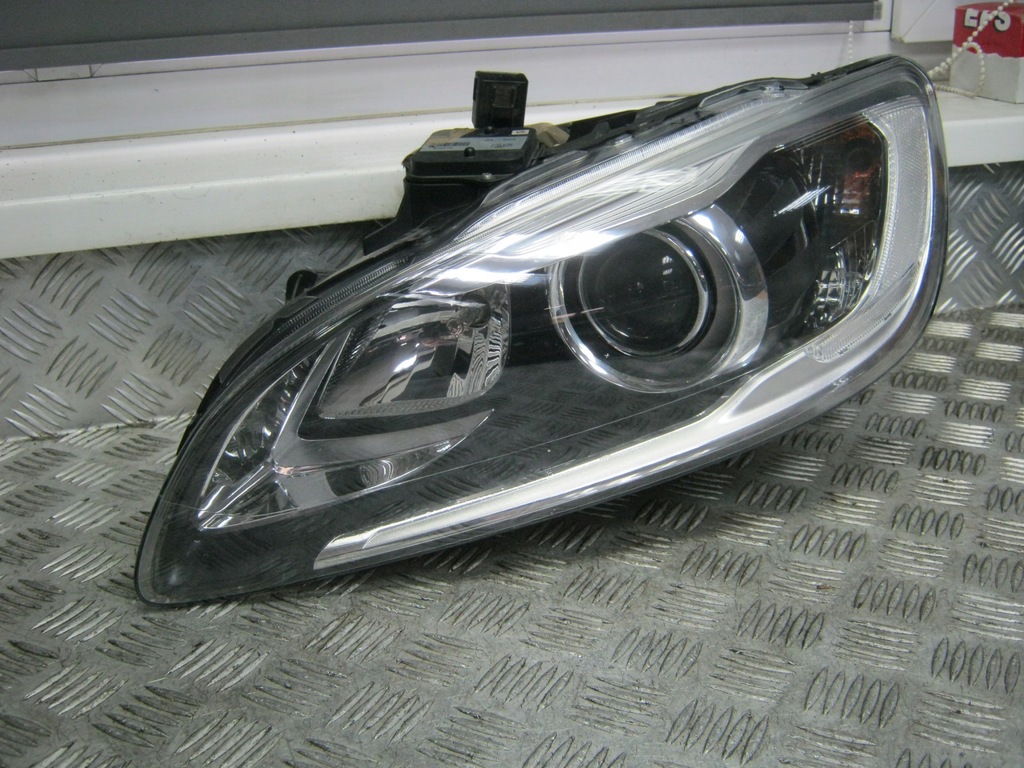 Reflektor xenon lewy Volvo V60 S60 Lift 31420108