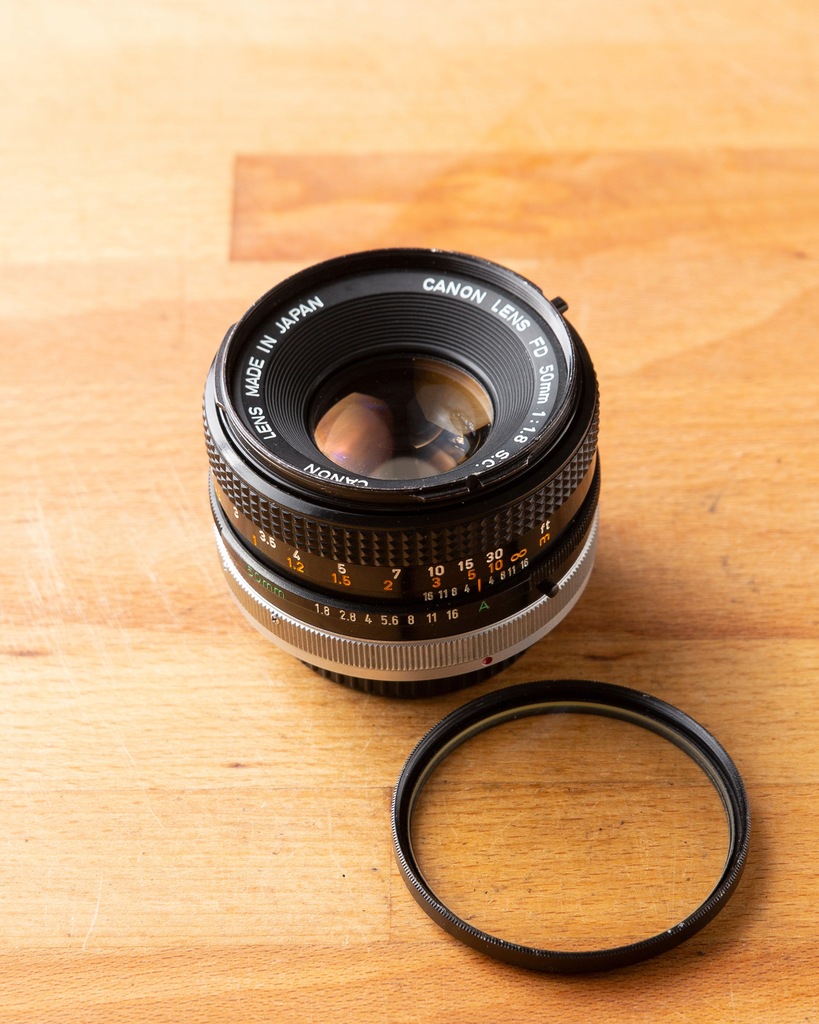 Obiektyw Canon FD 50mm F1,8 S.C. + UV + Dekielek