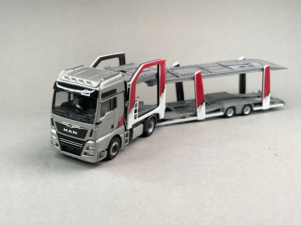 Купить MAN TGX XXL LOHR и 6 Audi UNIKAT — Herpa 1:87: отзывы, фото, характеристики в интерне-магазине Aredi.ru