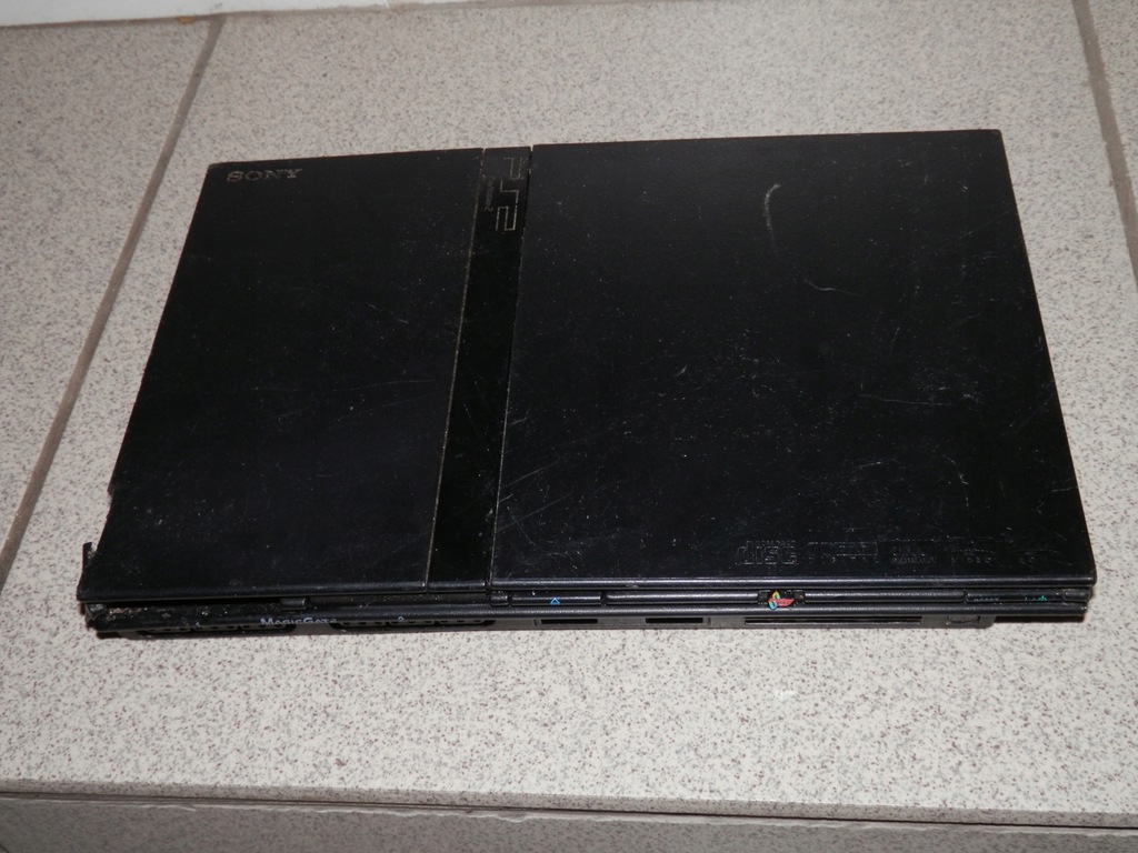 Konsola Sony PS2 slim scph-75004 uszkodzona