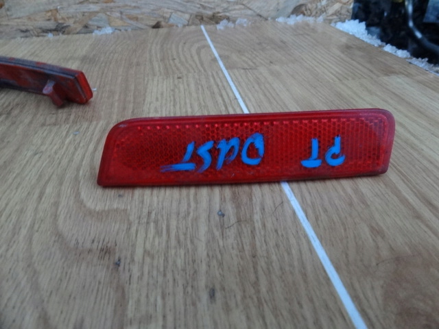 DACIA DUSTER 2011 ODBLASK ZDERZAKA PRAWY TYL ORG