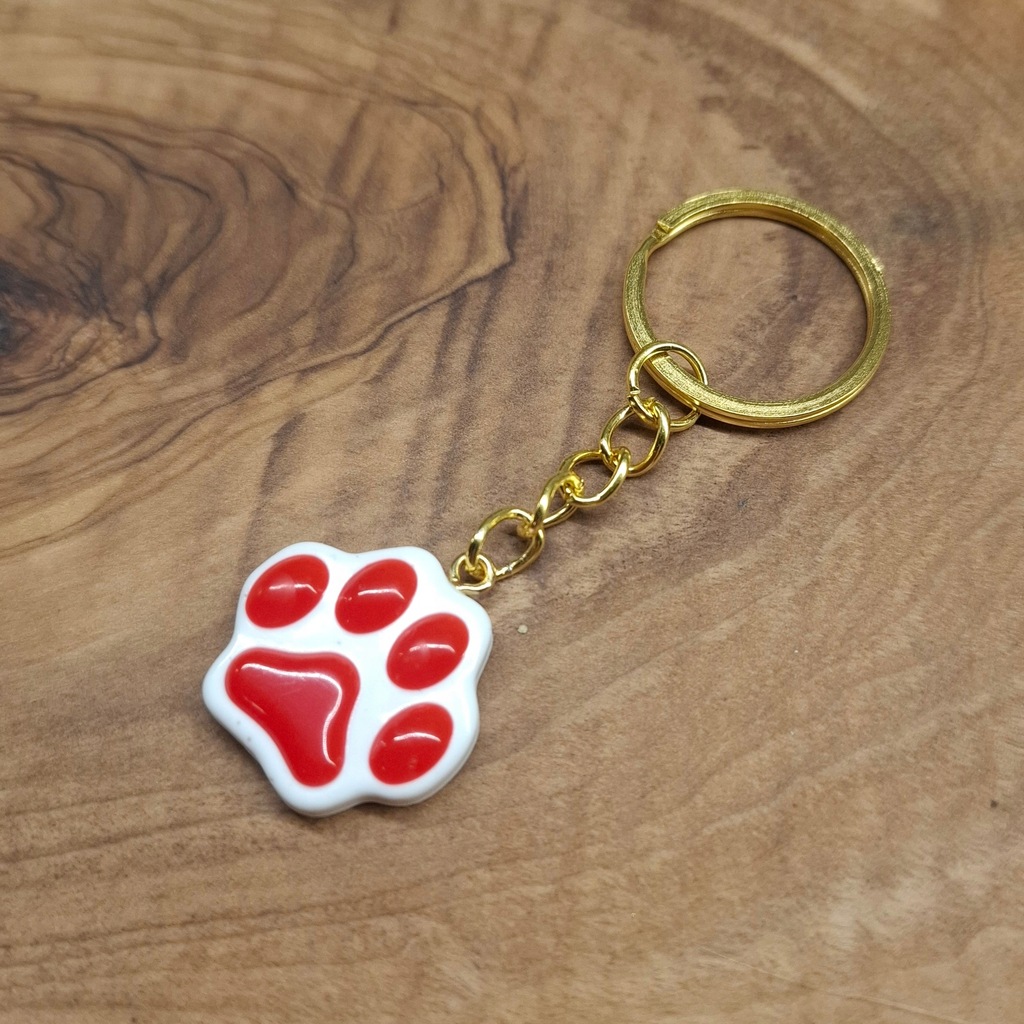 Brelok breloczek kocia łapka z żywicy epoksydowej WOŚP