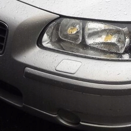 Volvo s60 headlight online washer cover replacement