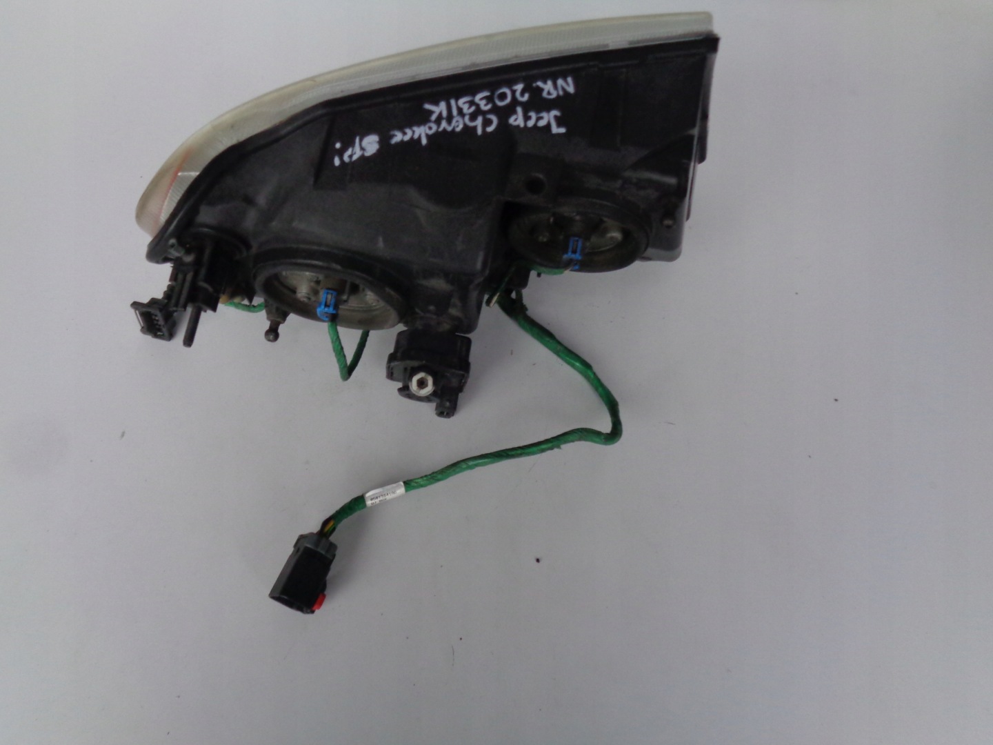 light left REFLEKTOR JEEP CHEROKEE 99-04