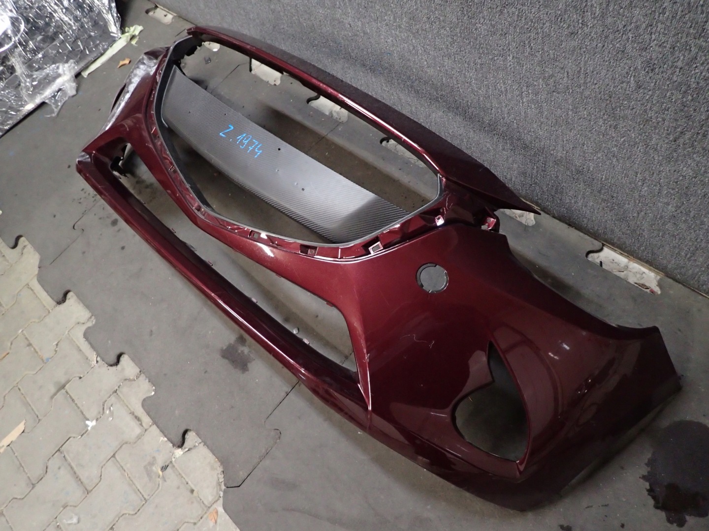 nárazník předek MAZDA II 2 13