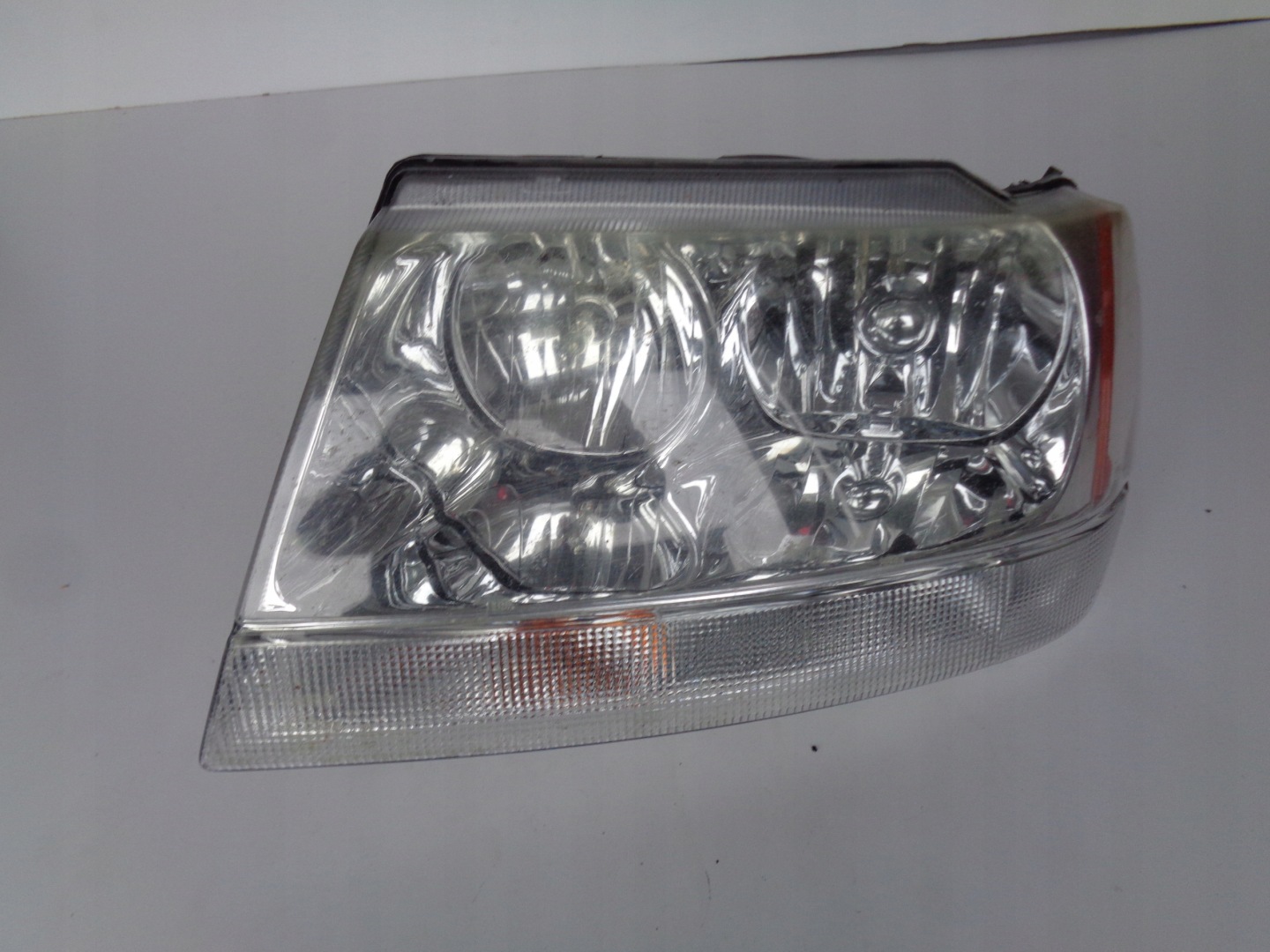 light left REFLEKTOR JEEP CHEROKEE 99-04