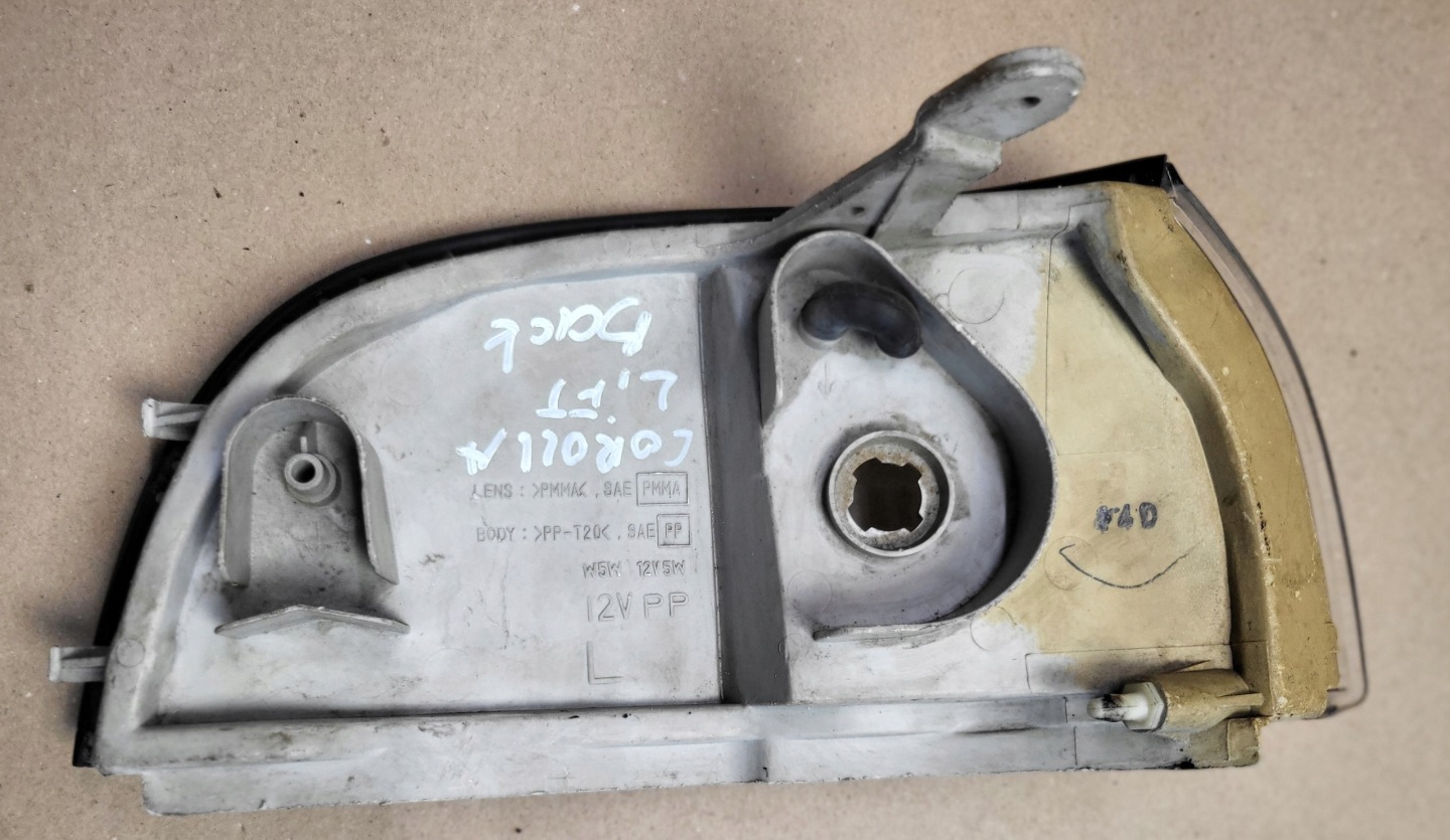 light front POZYCYJNA left TOYOTA COROLLA LIFTBACK original EU KOITO