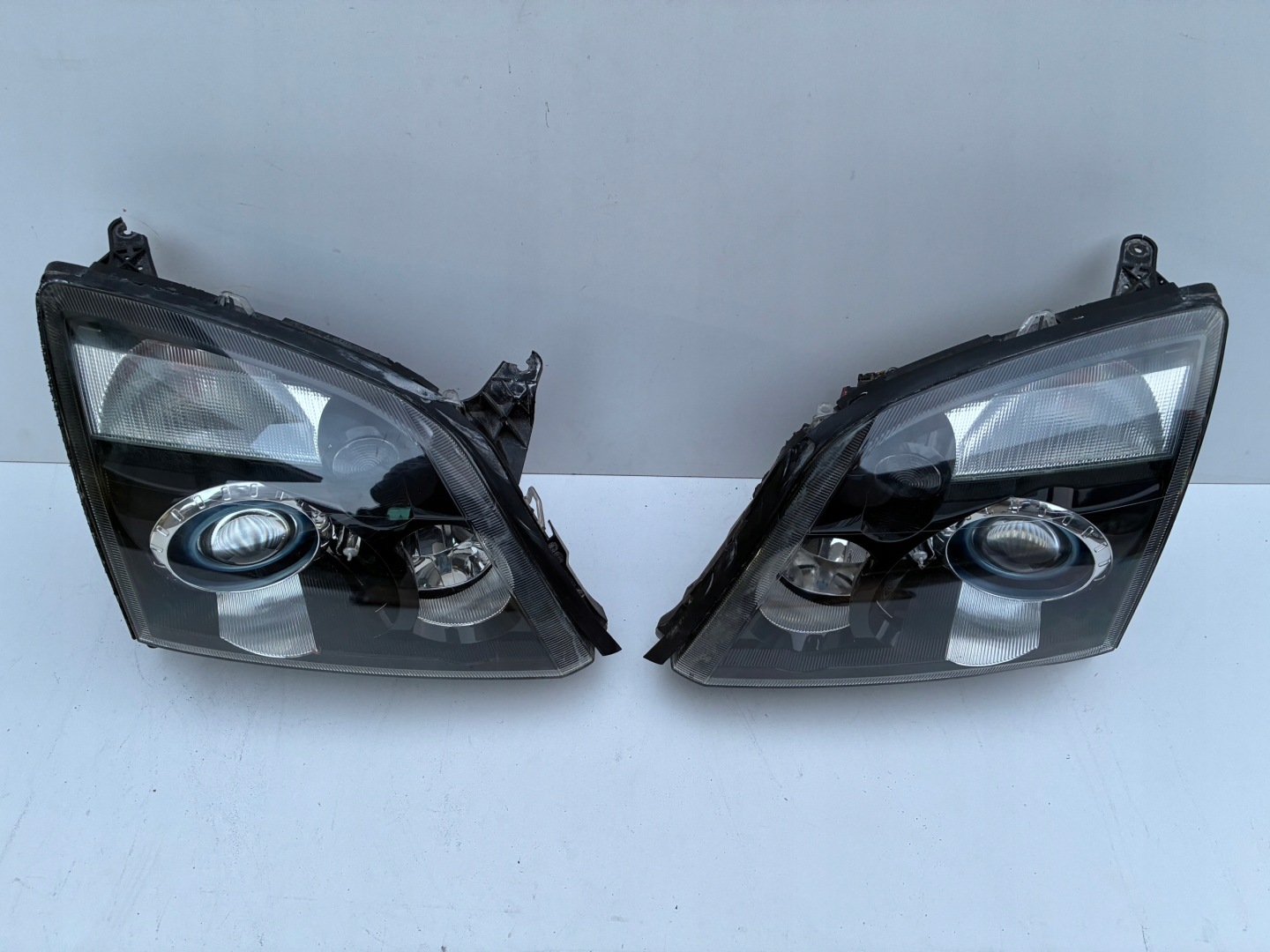 Reflektor light right left front Xenon positioning Opel VECTRA C 02-05r. OEM EU