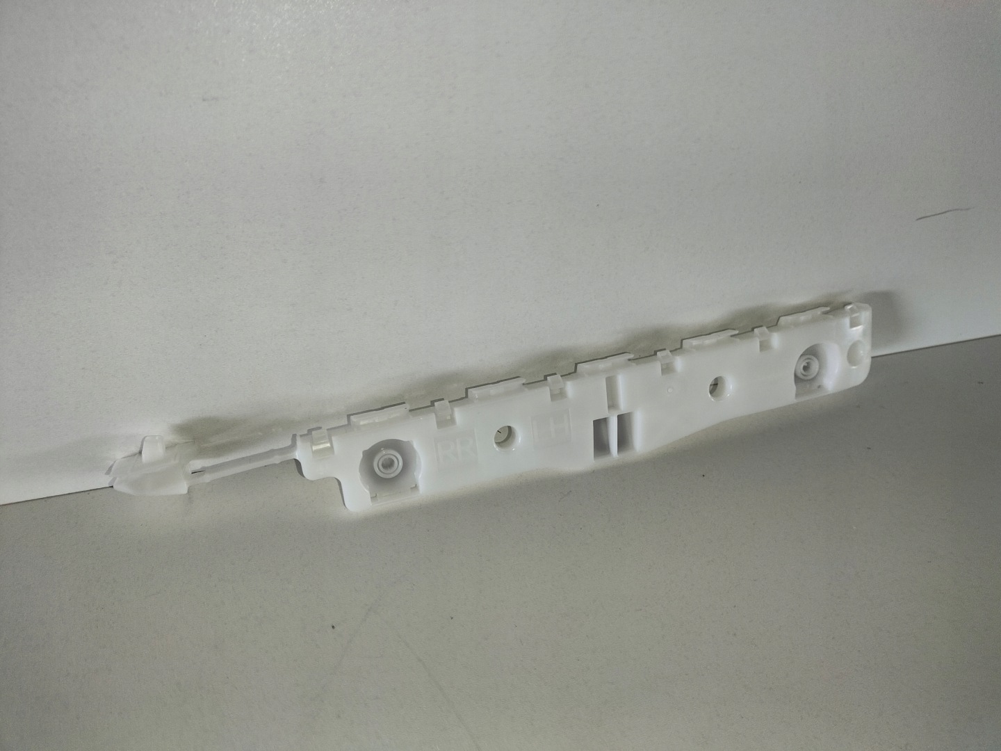 support holder rear part left NISSAN NV200 09-14