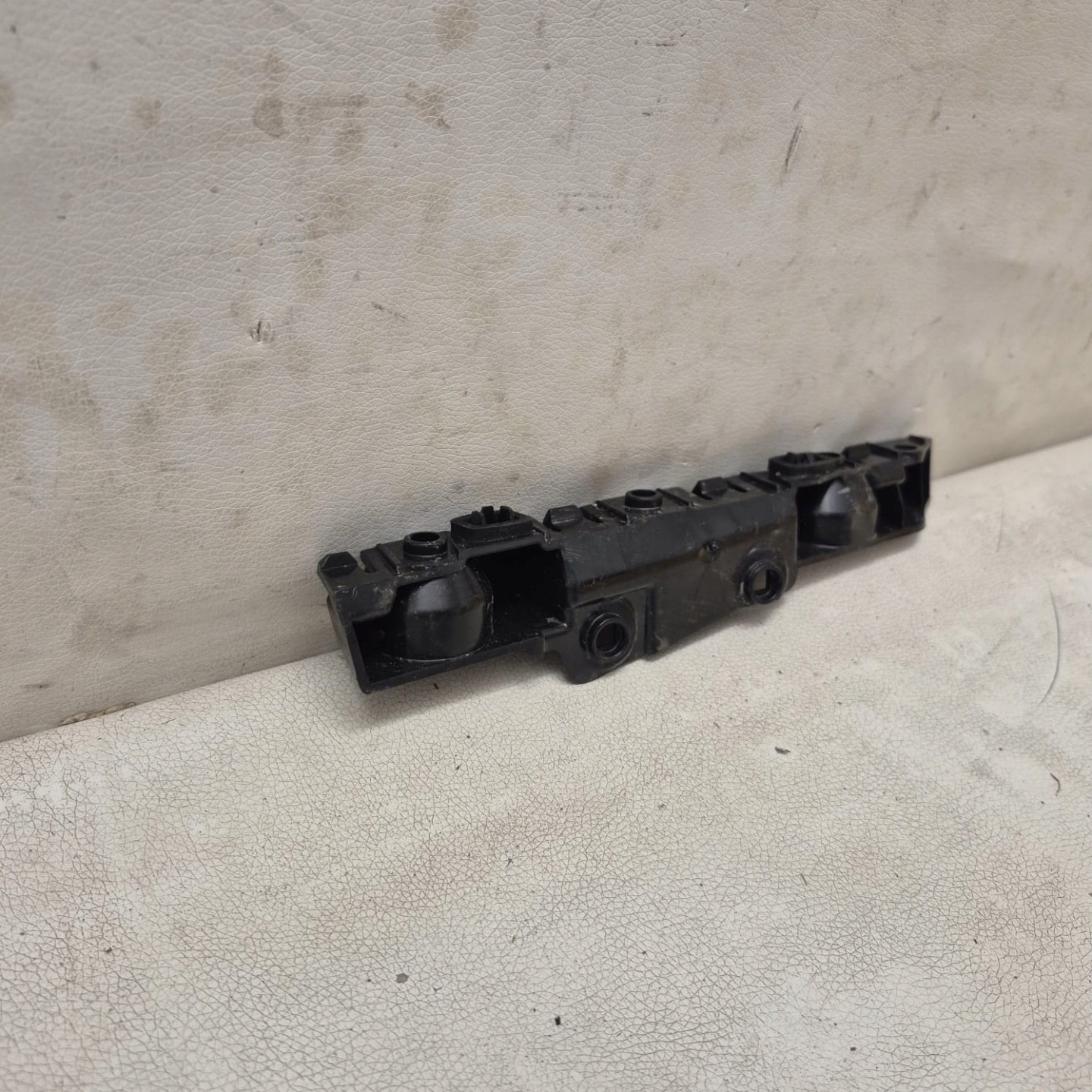 DACIA SANDERO III 3 20-> bracket holder support left rear part