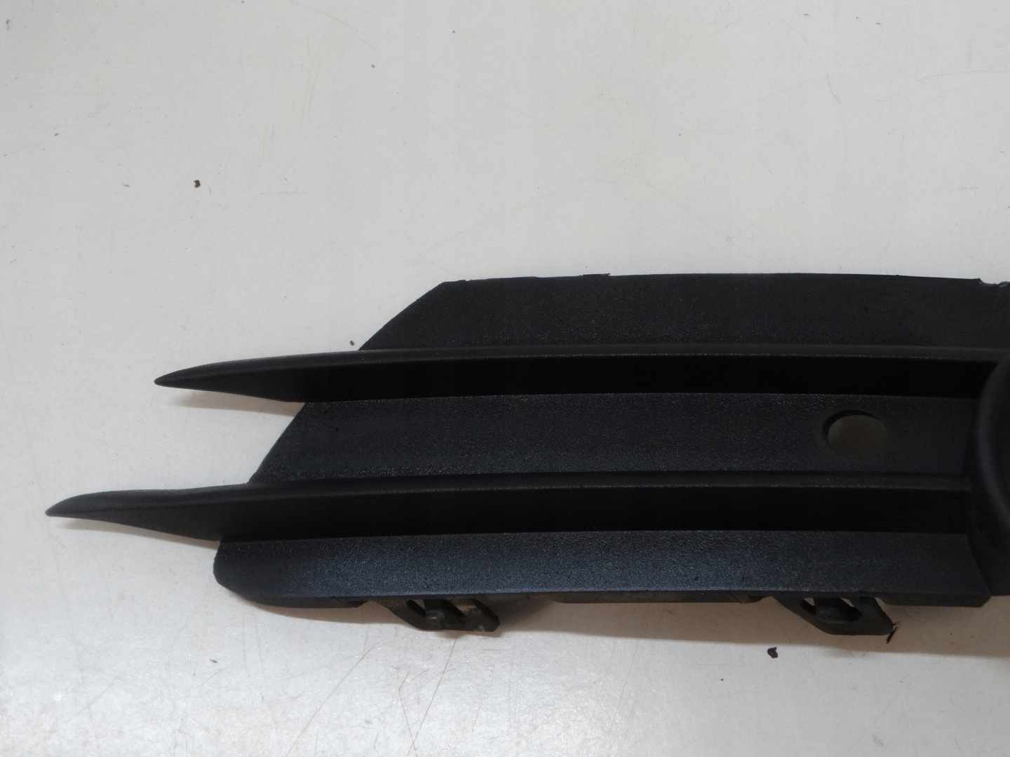 grid of a bumper left front OPEL CORSA D 13211478