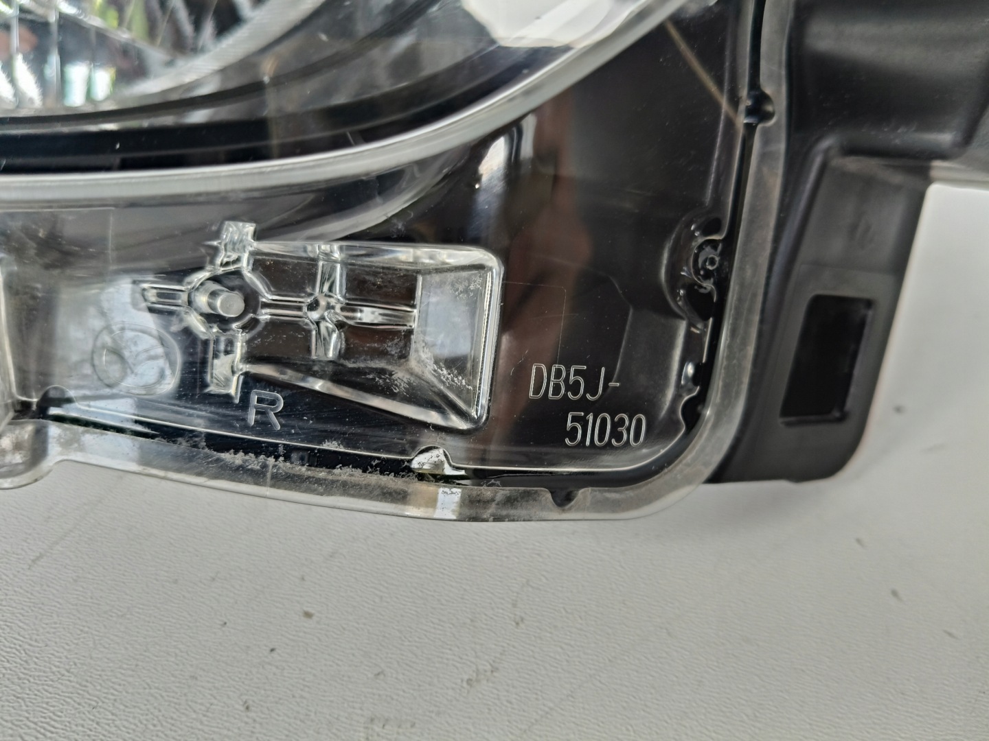 light right REFLEKTOR MAZDA 2 14